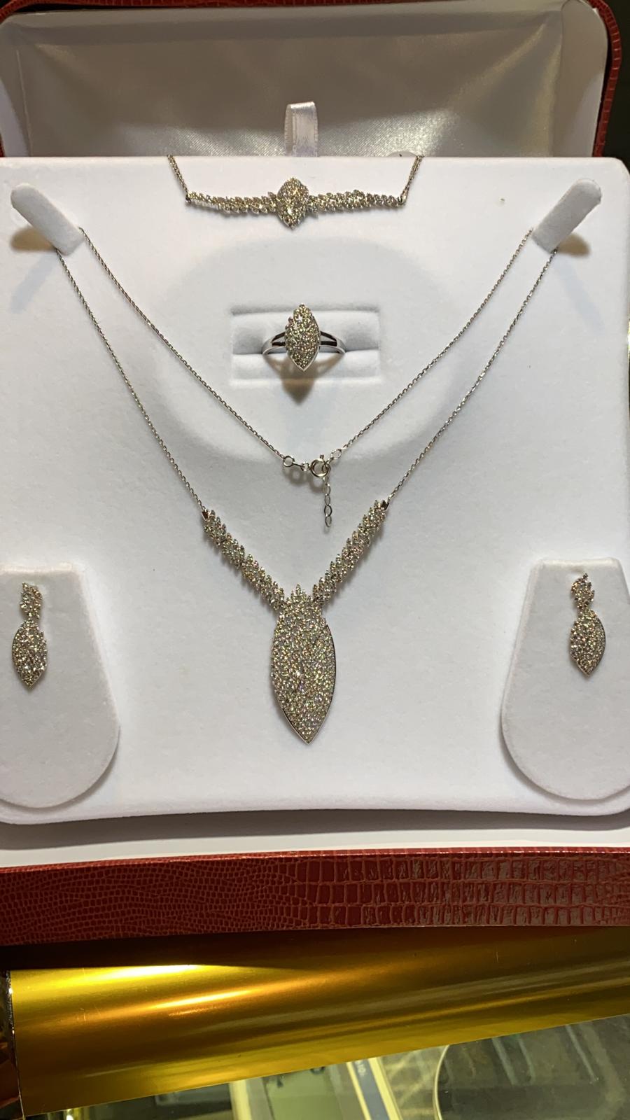 White gold set and Bracelet with American Diamonds, a Turkish designer Set.